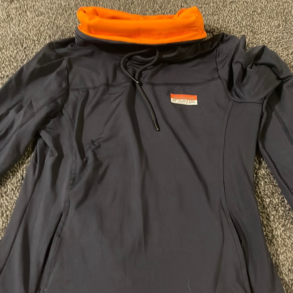 Pink ultimate crew neck. Size medium. Navy blue. Inside color is orange